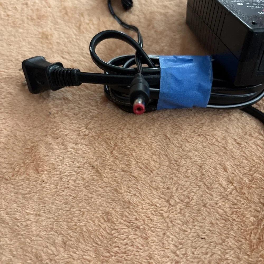 Adapter :model no: CTI#25-2302. input :120v AC. Out put 12V  DC 3.0A